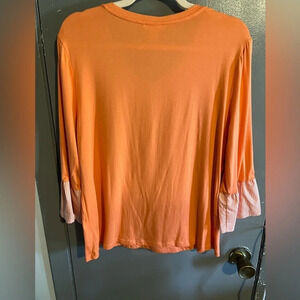 WESTBOUND sz large orange long sleeve shirt with stripped cuff sleeves.